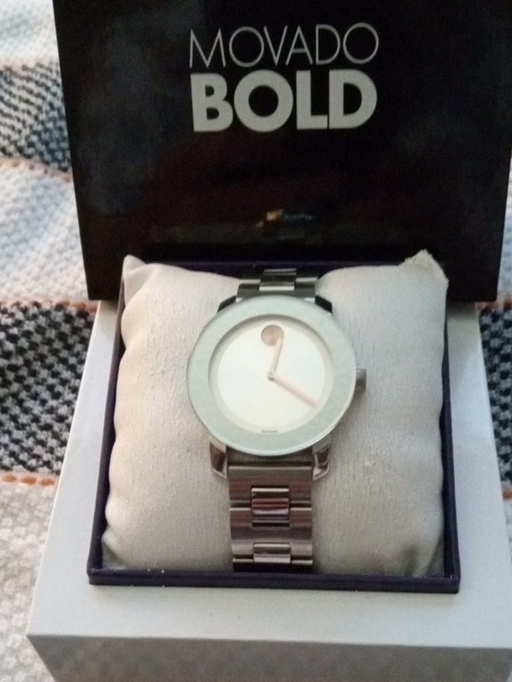 Movado Unisex's Silver Stainless Steel Bracelet Watch with Rose Gold Dial.